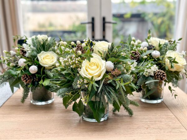 White rose and foliage table arrangement